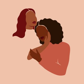 two women hug and care about each other